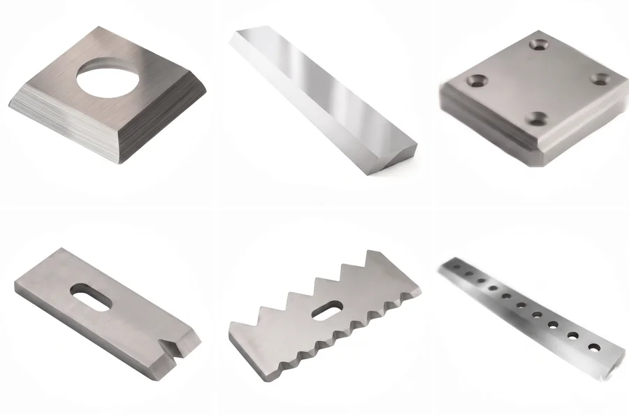 Sortiment unterschiedlicher Industriemesser-Geometrien für die Zerkleinerungstechnik: Wendeplatten, Flachmesser, Verschleißplatten, Reißzähne und gezahnte Messer